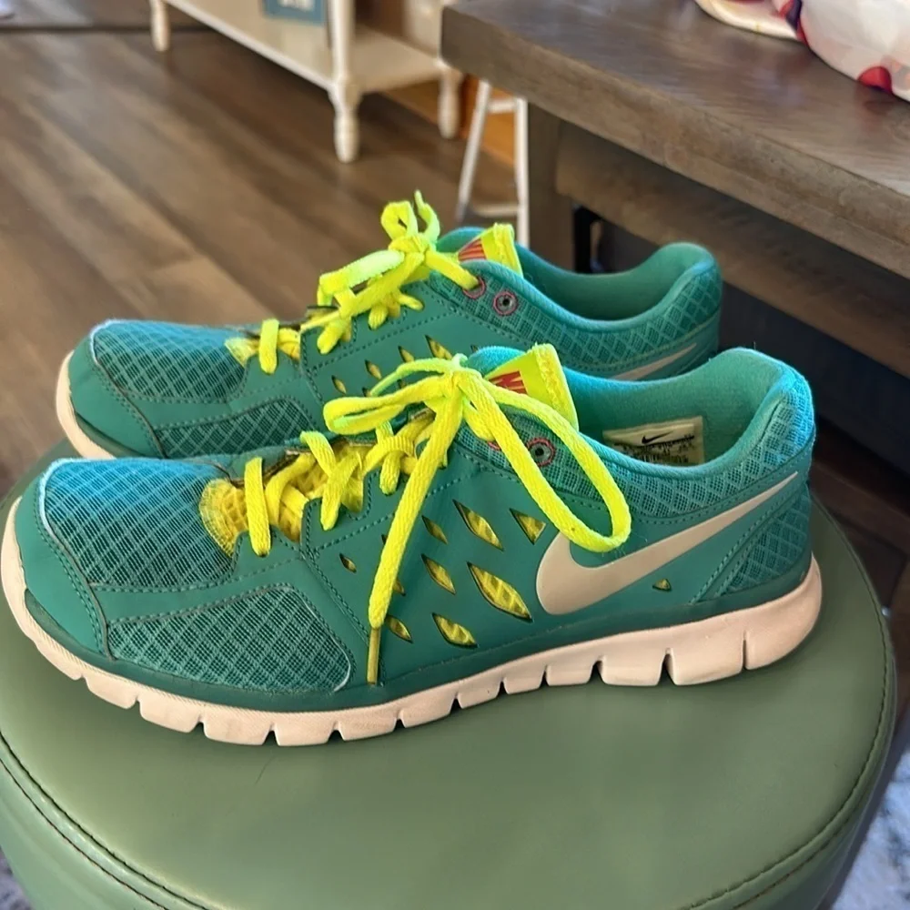 Nike running shoes, aqua blue, yellow, white size 9.5